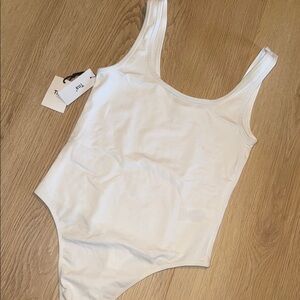 TNA White Bodysuit One Piece with Scoop Neckline